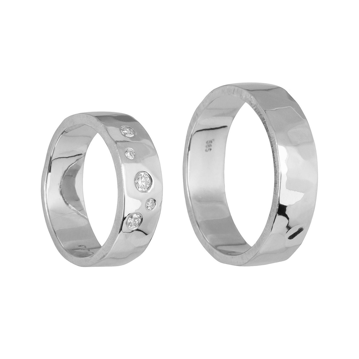 Facet 14 kt white gold diamond ring, side view.