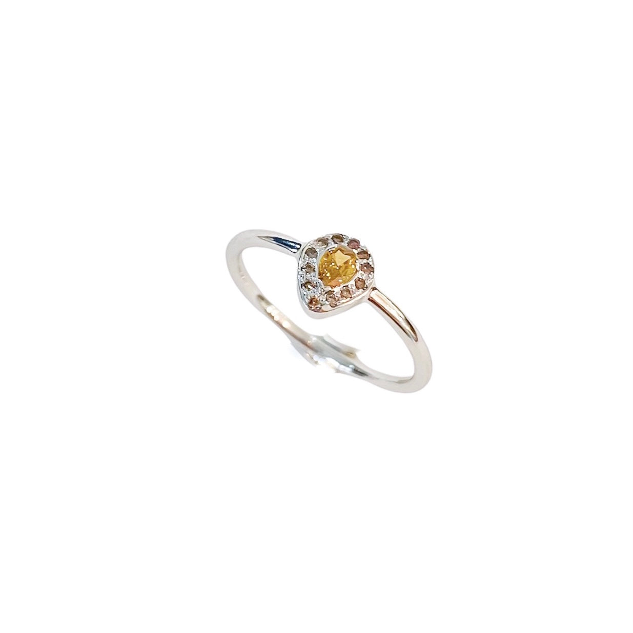 Fancy Natural 14 kt white gold ring, left top view.