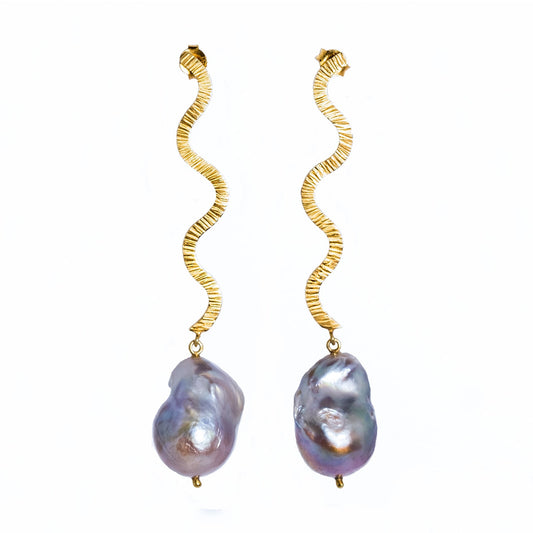 Shape Baroque Big gold plated pearl earrings, front view.