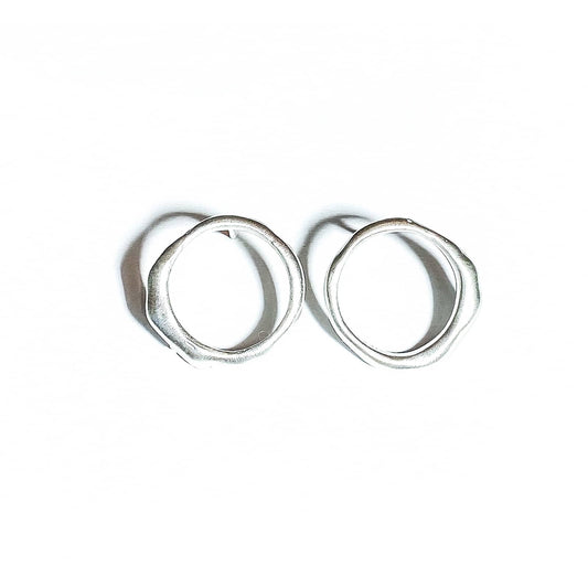 Curves Collection small silver earrings.