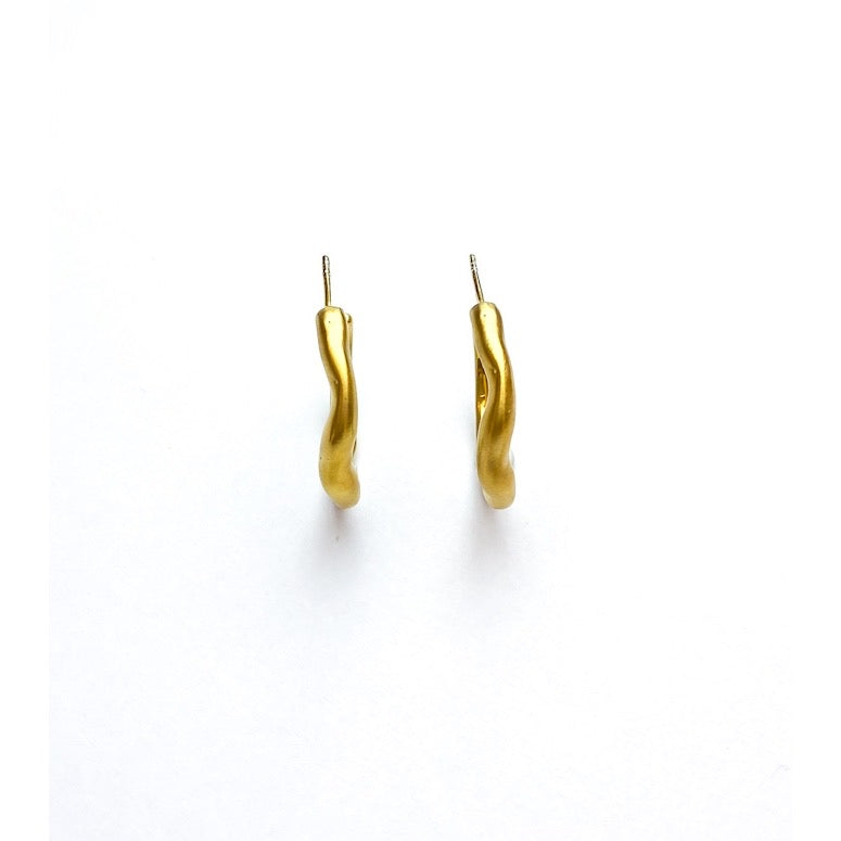 Curves Creole gold plated silver earrings, front view.
