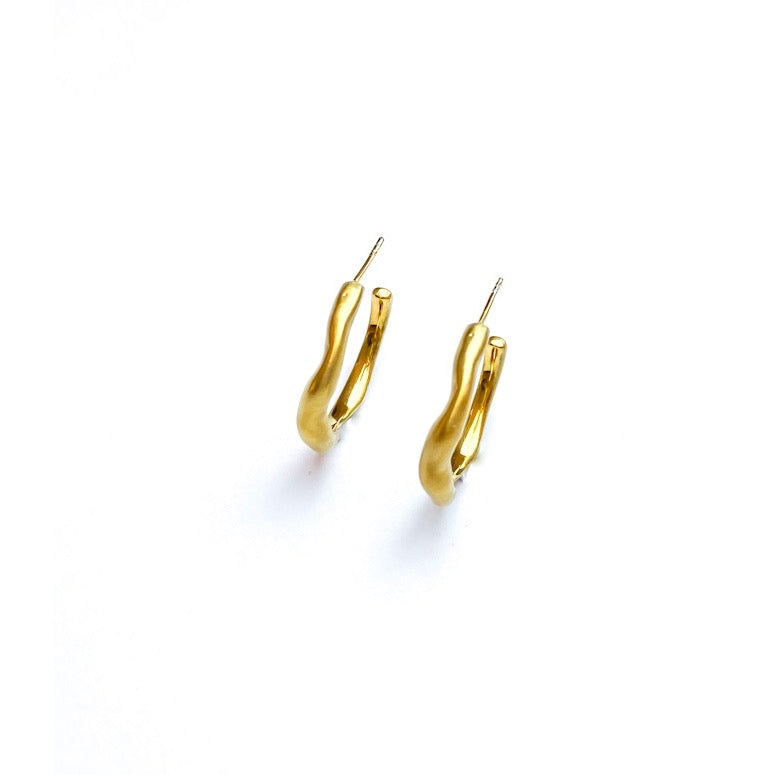 Curves Creole gold plated silver earrings, right side view.