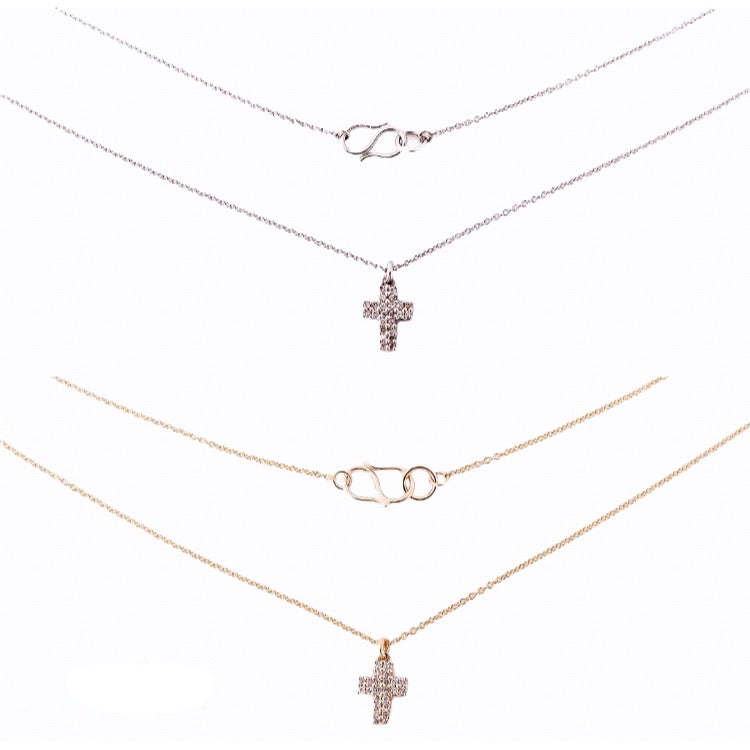 Diamond Cross 14 kt white gold and red gold necklaces.