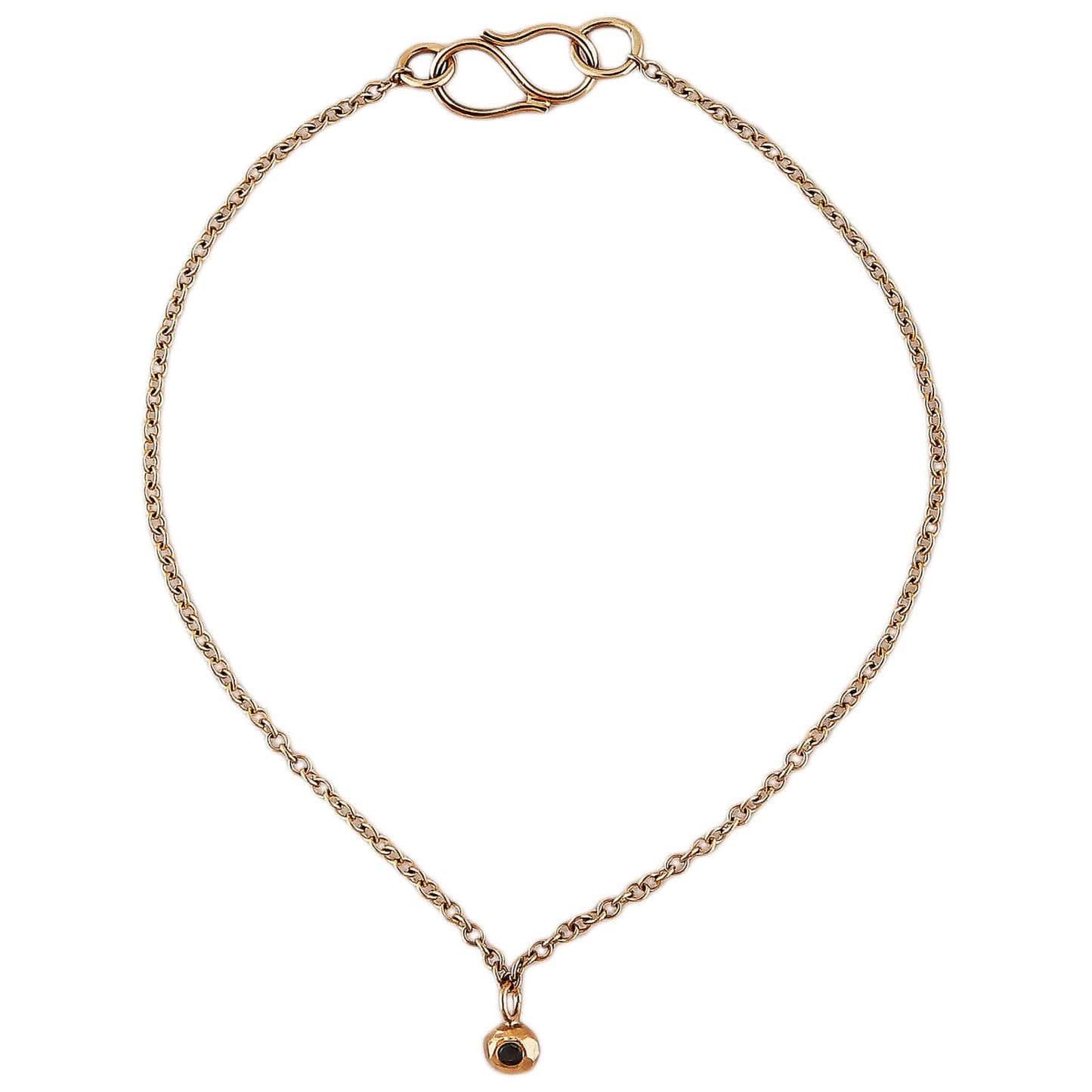 Dot 18 kt gold black diamond bracelet.