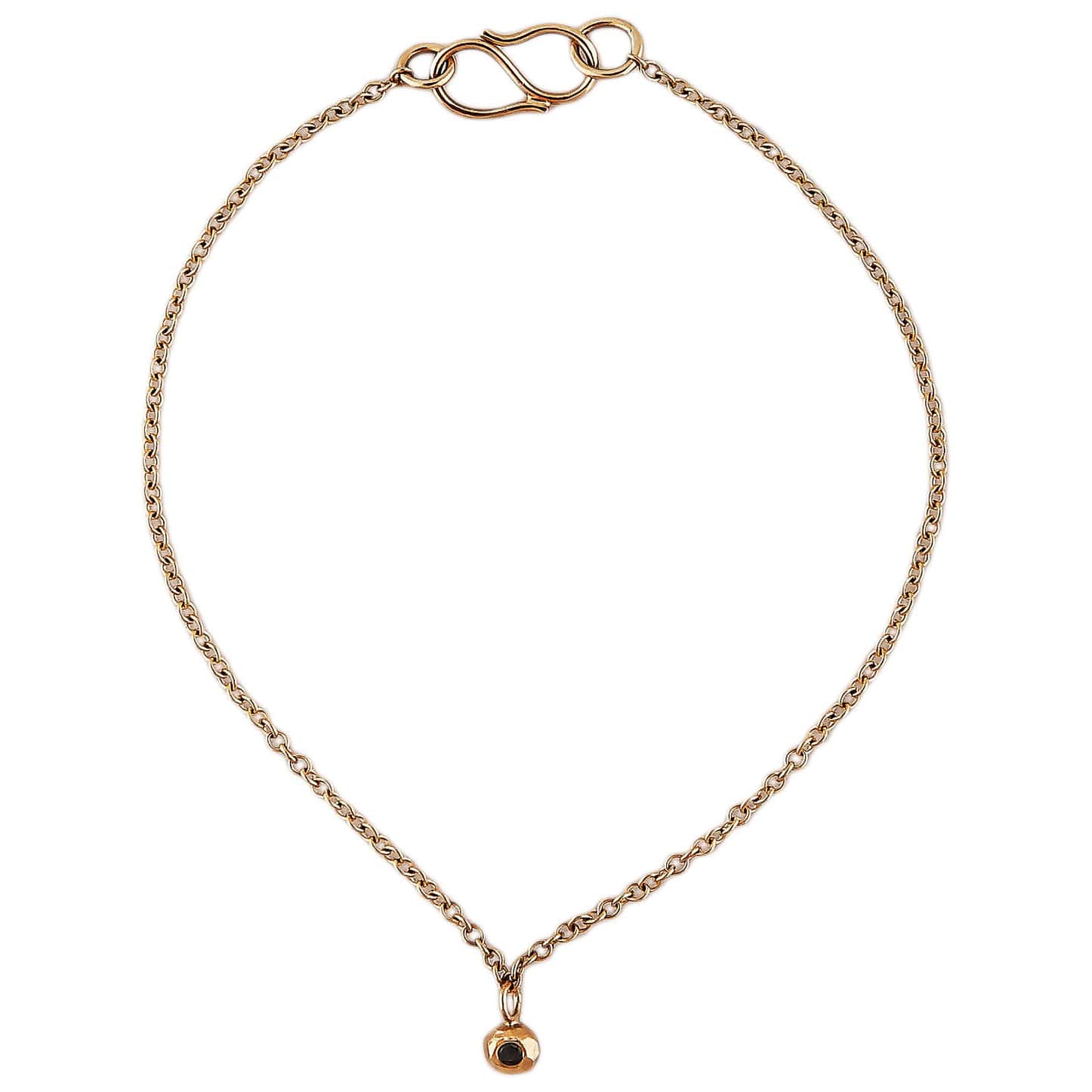 Dot 18 kt gold black diamond bracelet.