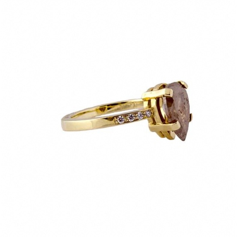 Fancy Opaque 14 kt gold diamond ring, side view.
