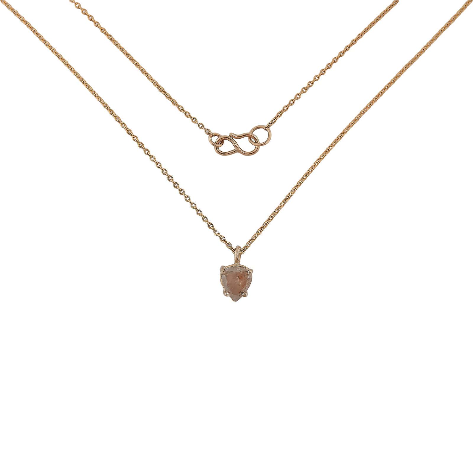 Fancy Opaque 18 kt gold diamond necklace hanging.
