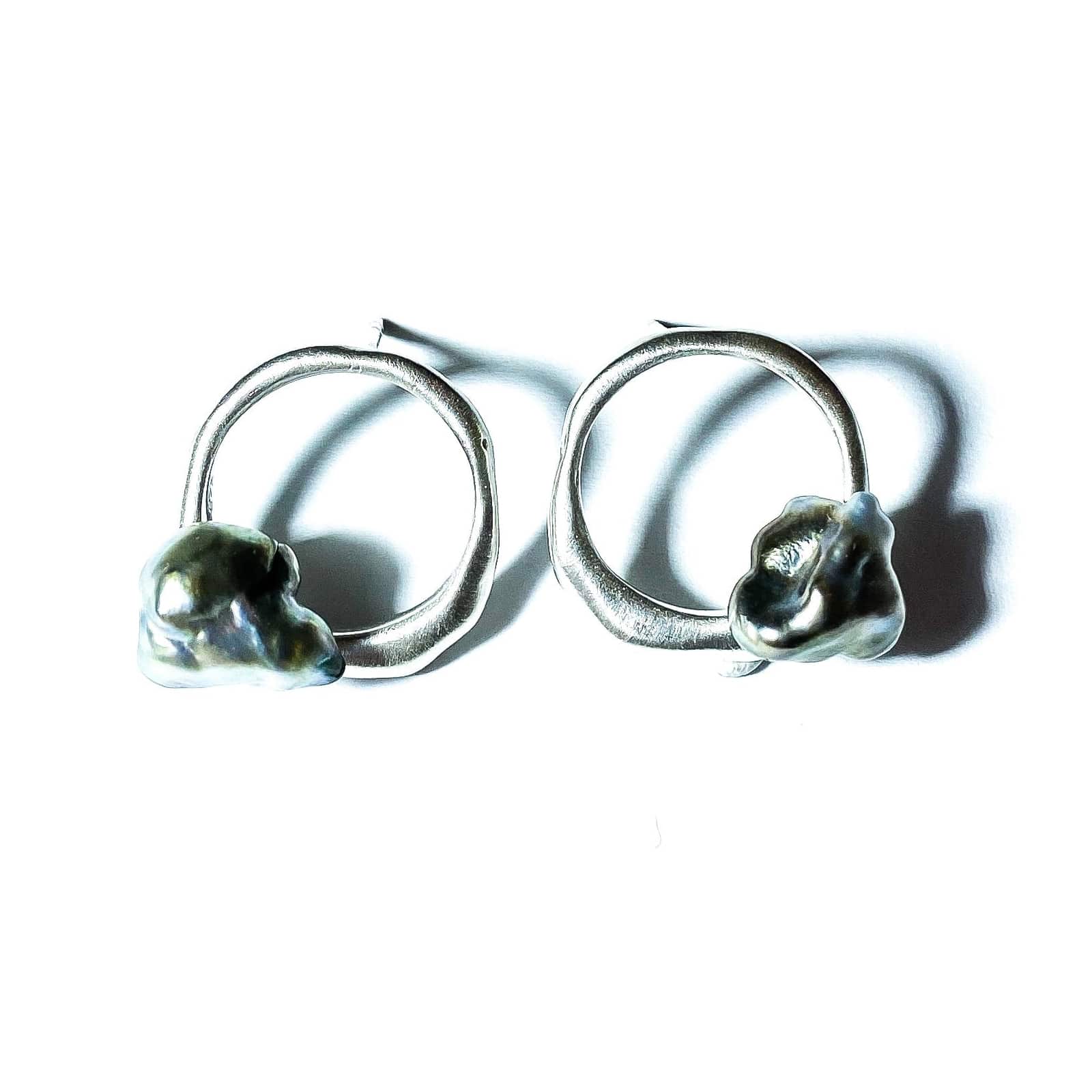 Keshi Curves silver pearl earrings.