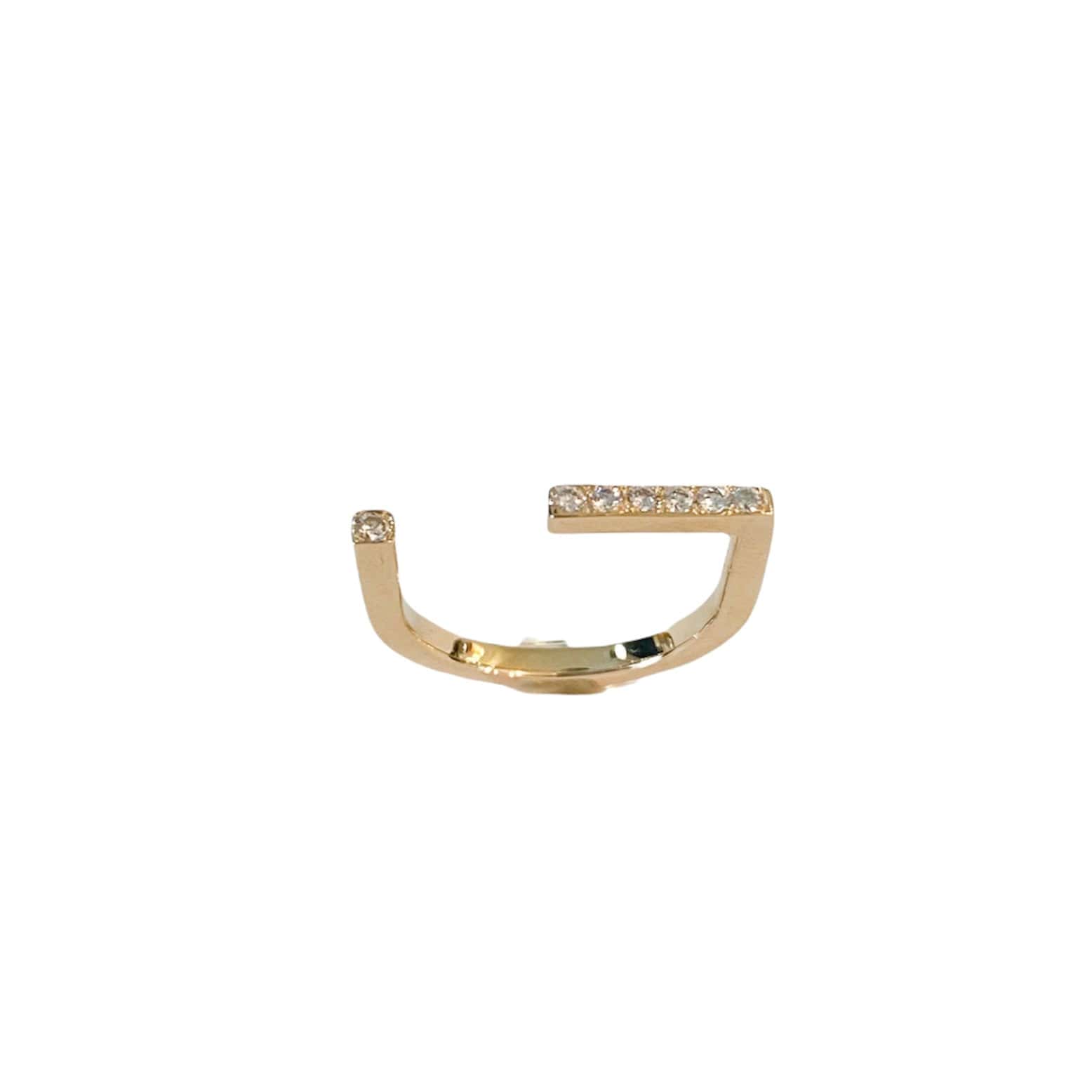 Rainbow 14 kt gold pave diamond ring, side view.