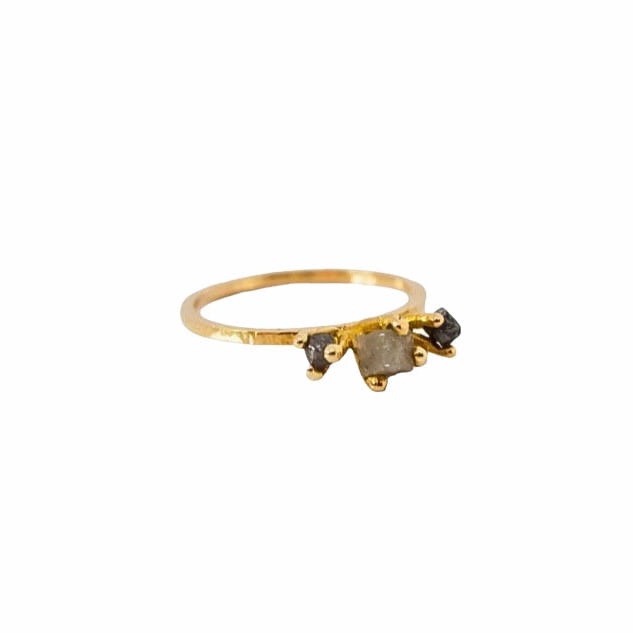 Raw 14 kt gold diamond ring, left side view.