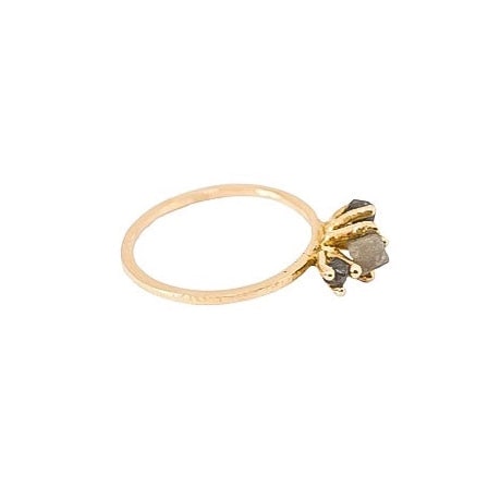 Raw 14 kt gold diamond ring, side view.