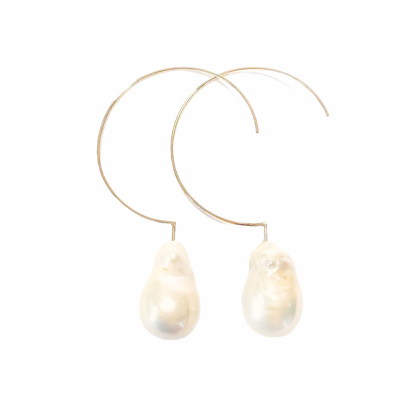 Simple Baroque 14 kt gold earrings.