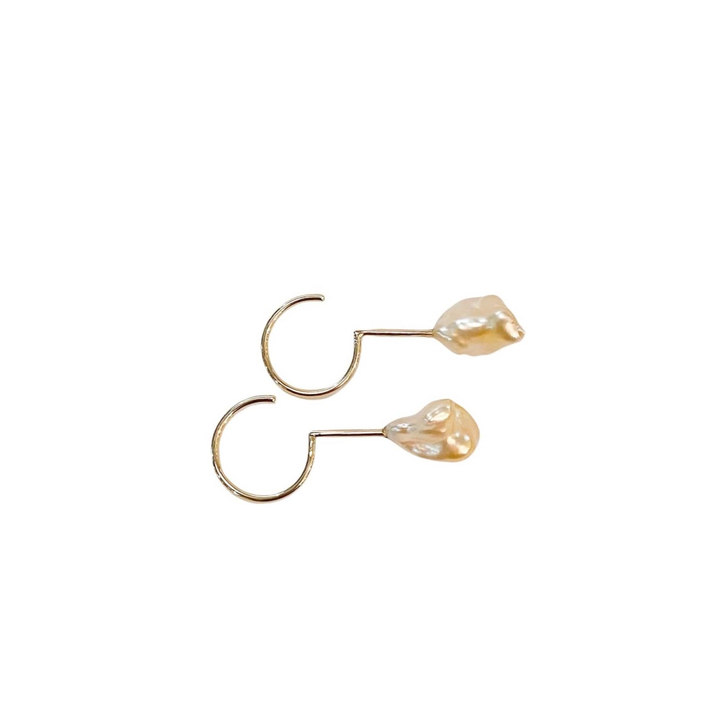 Simple Keshi Golden Small 14 kt gold earrings, side view.