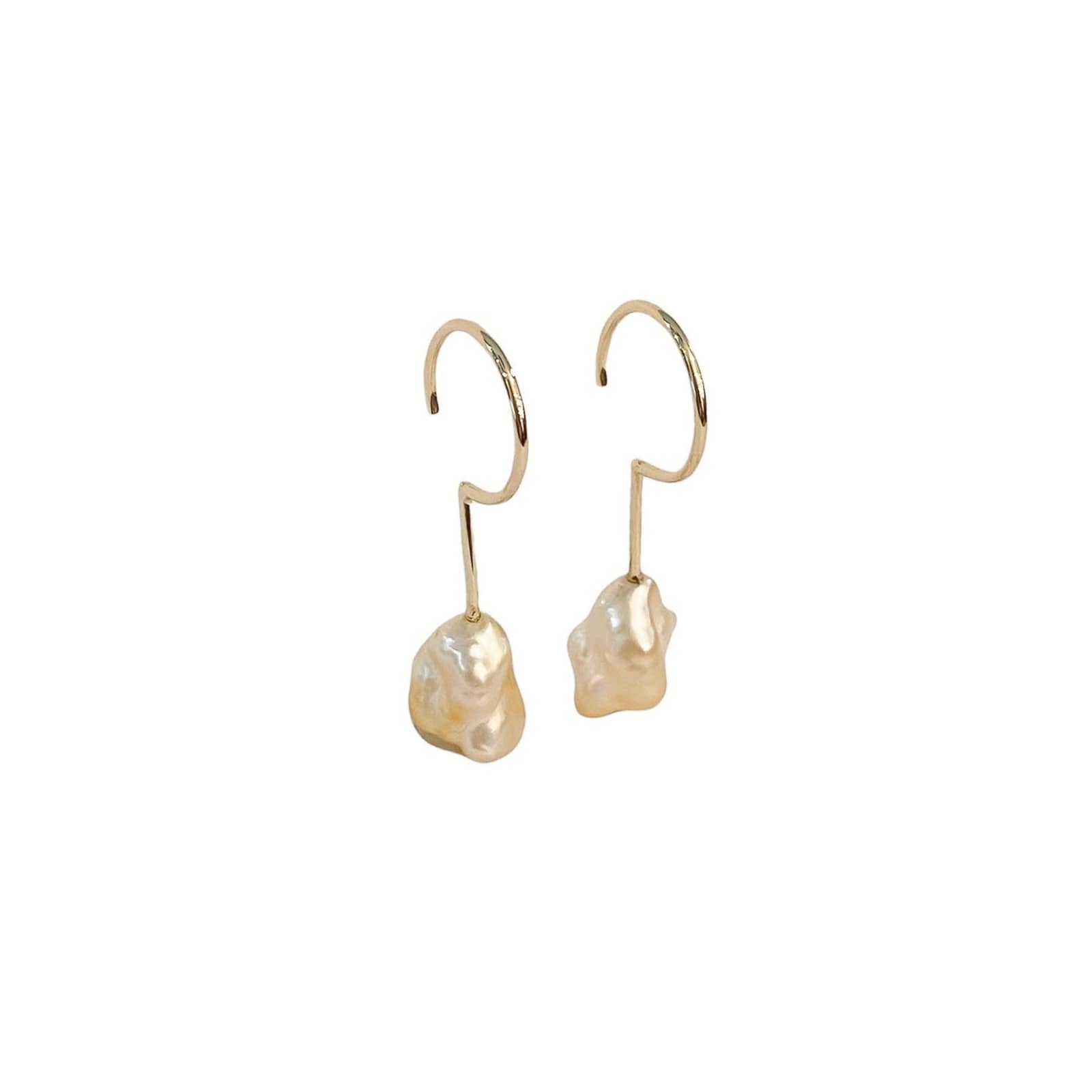 Simple Keshi Golden Small 14 kt gold earrings, top view.