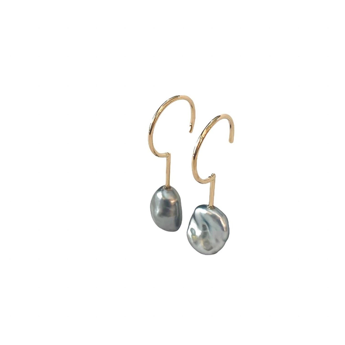 Simple Keshi Small 14 kt gold earrings, side view.